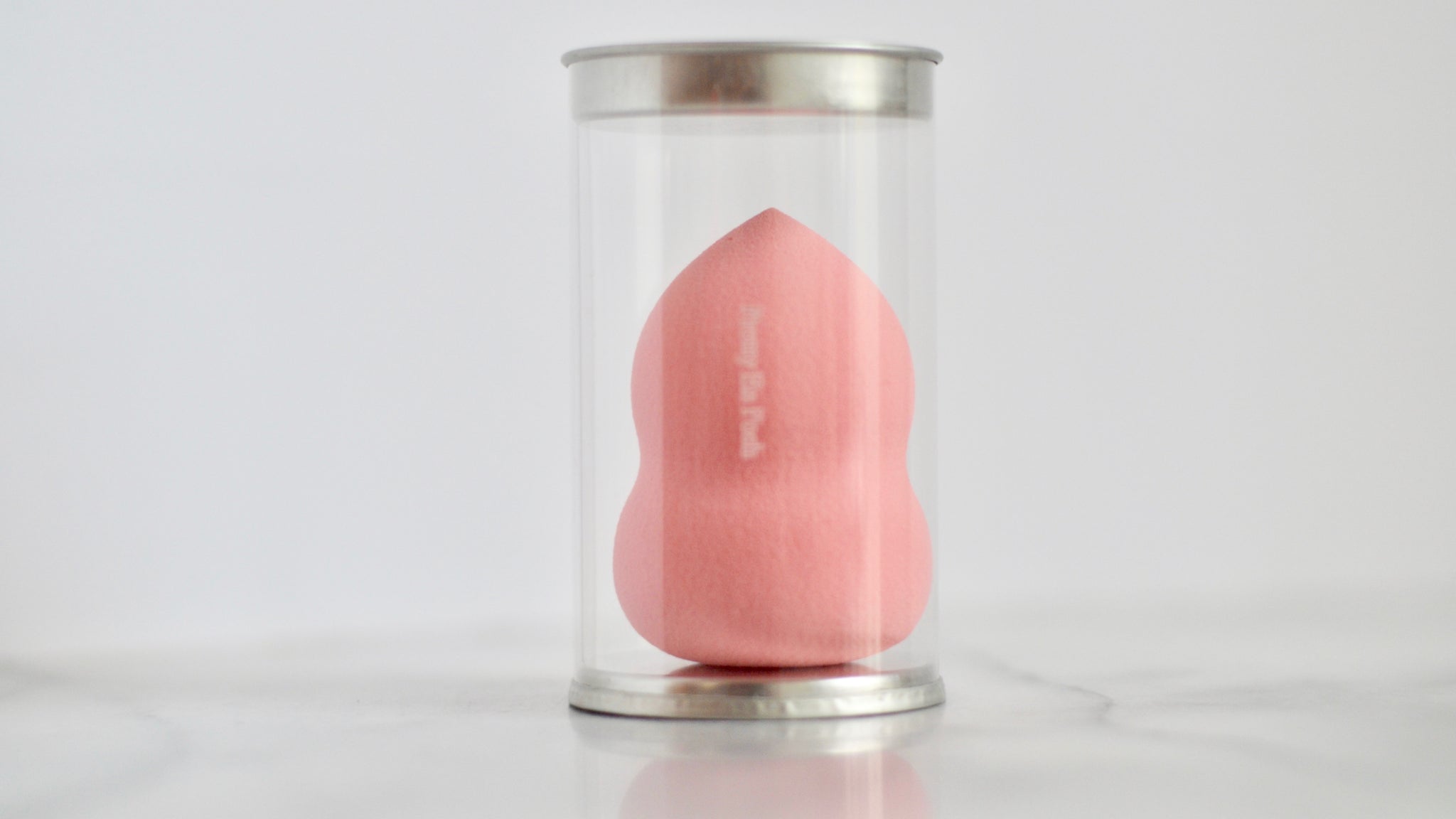 Pink makeup blender.